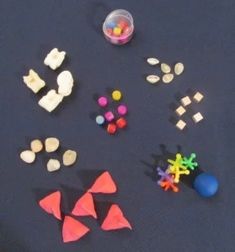 several different shapes and sizes of candy on a table