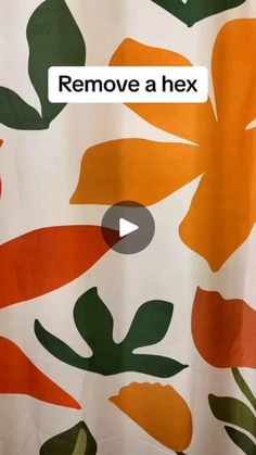 a shower curtain with an orange and green flower pattern on it, that says remove a hex