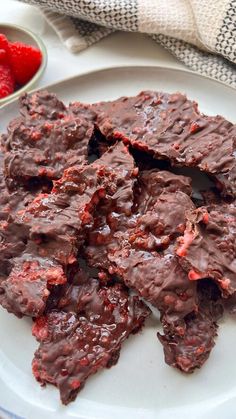 chocolate raspberry bark on a white plate