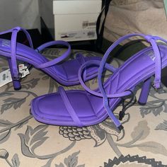 Never Worn Heels.Please See Pics Of Stained Areas On Heels.It Looks Like It Can Be Wiped Off Or Heels Can Be Cleaned. Size 40(Us9). Heel Height Looks Like A 3-3.5 Inch Purple Block Heel Shoes For Night Out, Purple Open Toe Heels With Sculpted Heel, Purple Block Heel Heels For Night Out, Purple Ankle Strap Heels For Night Out, Purple Sculpted Heel Spring Heels, Trendy Purple Evening Heels, Purple Sculpted Heel For Spring, Purple Open Heel Shoes With Heel Loop, Trendy Purple Heels With Heel Strap