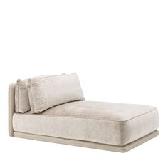 a white chaise lounger with two pillows on the back and one pillow on the side