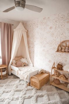 a child's bedroom with a canopy bed and teddy bears on the rugs