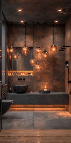 a bathroom with lights hanging from the ceiling