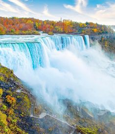 the niagara falls in autumn with colorful foliage