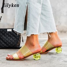 Shipping: Worldwide Express Shipping AvailableDelivery time: 7-15Days Fast ShippingReturns: Fast refund, 100% Money Back Guarantee.Brand Name: EilykenShoes Type: SlidesApplicable Place: OutsideUpper Material: PVCHeel Height: High (5cm-8cm)Origin: Mainland ChinaCN: GuangdongSeason: SummerHeel Type: Strange StyleItem Type: SlippersModel Number: A1-Fashion Element: CRYSTALDepartment Name: AdultOutsole Material: RubberWith Platforms: YesPlatform Height: 0-3cmStyle: ConciseInsole Material: PUPattern Trendy Beige Jelly Sandals With Round Toe, Trendy Closed Toe Jelly Sandals For Summer, Trendy Flat Heels For Beach Season, Beige Flat Heel Jelly Sandals For Spring, Beige Jelly Sandals For Spring, Beige Synthetic Jelly Sandals For Summer, Trendy Spring Jelly Sandals With Round Toe, Trendy Round Toe Heels For Beach Season, Trendy Round Toe Jelly Sandals For Spring