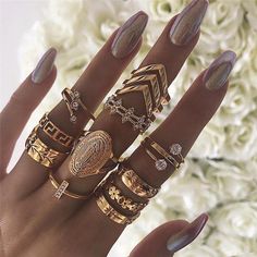 Discover Timeless Elegance with Our 13 Piece Medallion Ring Set! 💍✨ Elevate your accessory game and indulge in the epitome of sophistication with our 13 Piece Medallion Ring Set. Each ring is a masterpiece, meticulously crafted to enhance your style and add a dazzling touch to any ensemble. 🌟 Key Features: Exquisite Design: Adorned with Austrian crystals and coated in luxurious 18K gold plating, these rings shimmer with unmatched brilliance, making them the perfect addition to your jewelry collection. Durability Guaranteed: With a precision of 0.15" and crafted to last a lifetime, these rings are designed to retain their color and shine, ensuring they stay stunning through countless wearings. Hypoallergenic Excellence: Crafted from hypoallergenic materials, these rings are gentle on the Midi Ring Set, Ring Model, Wedding Bride Jewelry, Vintage Gold Rings, Boho Crystal, Knuckle Ring, Trendy Ring, Moon Ring, Set Style