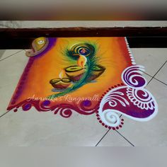 an artistic painting on the floor with peacocks