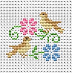 cross stitch pattern with two birds and flowers