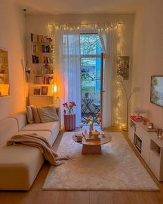 a living room filled with furniture and lights