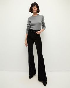 The best-selling Beverly is back, now updated in soft and sumptuous cotton velvet—with stretch for ease. Everything else you love about the made-in-LA style remains the same—from the high-rise to the skinny-flare pant silhouette that gives you legs for days. Pair these black velvet flares with a turtleneck, a dickey jacket and platform clogs for a classic VB look.52% Cotton, 39% Modal, 7% Polyester, 2% SpandexMade in LATurn jeans inside out and machine wash on coldStyle #J23105270644BK Velvet Flare Pants, La Style, Athleisure Dress, Velvet Flares, Flare Pant, Platform Clogs, La Fashion, Veronica Beard, Cotton Velvet