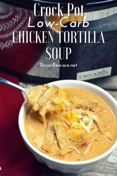 crock pot low - carb chicken tortilla soup in a white bowl