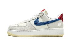 The Undefeated x Nike Air Force 1 Low “5 On It” is a collaboration between the California based sneaker boutique and Nike on the vintage basketball shoe that displays five unique materials on its design.  An August 2021 release by the longtime collaborators, the “5 On It” has a blue snakeskin Swoosh and a red snakeskin heel tab.  The eyelet panels appear in grey suede, the mid-panel comes in Sail canvas, and the perforated toe is cast in cream leather.  Undefeated’s “5 Strikes” logo can be found Custom Sneakers Diy, Sneaker Boutique, Vintage Basketball, Snakeskin Heels, Nike Air Force 1 Low, Mens Nike Air, Stadium Goods, Grey Suede, Air Force 1 Low