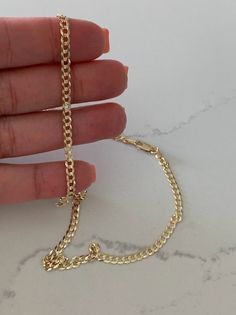 The 14K Gold 3.6 MM Cuban Concave Chain Link is the perfect piece of jewelry for everyday wear. Crafted with a solid 14K Yellow Gold Cuban Link, it measures 18", 20", 22" or 24" and is 3.6MM wide, making it an exquisite and fine addition to any wardrobe. ------------------------------------------------------------------------------------------------- 14K Gold Cuban Chain, 3.6MM Shiny, Cuban Link Necklace, Cuban Link , Genuine Gold Necklace, Solid Gold Cuban Chain Necklace------------------------ Gold Cuban Link Necklace With Cable Chain, Gold Cuban Link Necklace With Cable Chain As Gift, Elegant Gold Cuban Link Necklace With Cable Chain, Cuban Link Necklace With Cable Chain As A Gift, Cuban Link Necklace As A Gift, Yellow Gold Cuban Link Necklace With Cable Chain, 14k Yellow Gold Cuban Link Necklace, Gold Cuban Link Necklace With Figaro Chain, 14k Yellow Gold Cuban Link Necklace With Oval Links