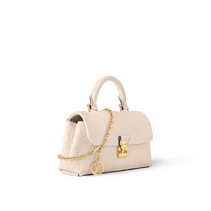 LOUIS VUITTON® - Nano Madeleine - Cream Logo Lv, Micro Bags, Louis Vuitton Official Website, Book Bags, Trunk Bag, Wallet Pouch, Monogram Bag, Silver Jewelry Fashion, Business Bag