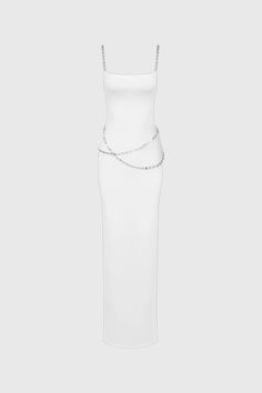 This dress is a stunning bodycon maxi dress that perfectly hugs the figure, highlighting the silhouette. It features chain straps, adding a unique and edgy touch to the overall design. The dress also has chains around the waist, providing an element of glamour and sophistication. The square neckline adds an elegant touch, beautifully framing the collarbone. Made from stretchy fabric, this dress ensures comfort while maintaining its stylish appeal.Fabric: Cotton, Polyester, Elastane Spaghetti Strap Dresses With Chain Strap For Night Out, Elegant Body Chain For Night Out, Elegant Backless Body Chain For Party, Fitted Body Chain For Parties, Chic Evening Body Chain With Chain Strap, Elegant Party Body Chain, Fitted Chain Detail Dress For Party, Fitted Chain Detail Party Dresses, Fitted Chain Dresses