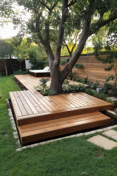 floating deck around a tree idea using deck blocks Backyard With Tree In The Middle, Tree Through Deck, Tree In Patio, Small Deck Around Tree, Tree In Decking, Backyard With A Lot Of Trees, Terraced Side Yard, Decks Around Trees Backyards, Porch Around Tree