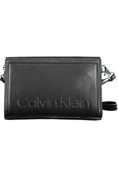 Elevate your accessory game with the sleek and sustainable Calvin Klein shoulder bag. Expertly crafted with a forward-thinking blend of 51% polyester and 49% polyethylene, this bag takes a bold step into eco-chic territory, offering a removable shoulder strap for versatile styling. Stash your essentials in the nifty internal card pocket, and trust the secure zip closure to keep your valuables safe. Punctuated with the unmistakable Calvin Klein logo, this black beauty captures the essence of modern luxury. Material: 51% Polyester, 49% Polyethylene Country of origin: KH Color: Black Calvin Klein Shoulder Bag, Eco Chic, Conscious Fashion, Wedge Pumps, Black Shoulder Bag, Calvin Klein Black, Look Casual, Leather Hobo, Black Handbags