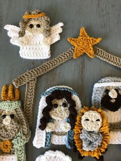 crocheted nativity items displayed on wooden surface