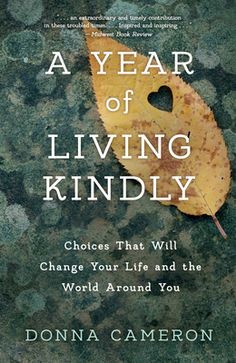 the cover of a year of living kindly by donna cameronon, with a yellow leaf on it