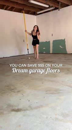 a woman holding a broom in an empty garage with the caption you can save $ $ $ on your dream garage floors