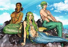 three mermaids are sitting on the rocks together