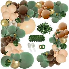 an assortment of balloons and greenery arranged in the shape of a circle