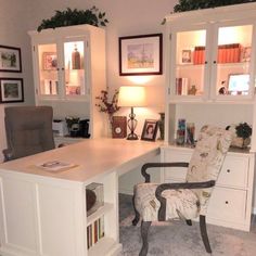 a chair sitting in front of a white desk