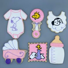 decorated cookies with baby items on them