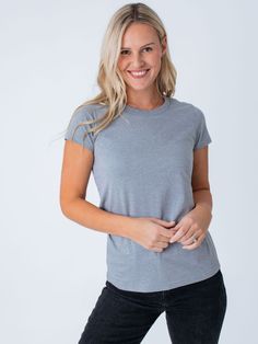 The Women's Crew Neck 4-Pack is your ticket to a stylish, comfortable, and affordable wardrobe. With four tees in timeless colors, including Black, White, Wedgewood and Heather Grey, you'll always have the perfect go-to piece. And the best part? The soft fabric and flattering fit mean you'll feel amazing every time you wear them. Made with StratuSoft, our super soft cotton-poly fabric blend High-quality material that washes well and doesn’t wrinkle easily Preshrunk and semi-fitted for a timeless Cozy Fabric, Be Honest, Style Statement, Make You Feel, Cool T Shirts, Amazing Women, Classic Black, Soft Fabric, Heather Grey