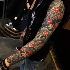 a person with a tattoo on their arm