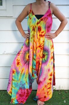 "💥One Size Fits Most Comfortable Tie Dye Hippie Jumpsuits Rompers Pants, Hippie Dress, Wide Legs Jumpsuits, Festival Clothings, Summer Clothing, Harem Dress, Beach Wear 👉One-of-a-kind hand dyed rompers 👉Fabric: 100% Soft and Breathable Rayon 👉Adjustable Tie shoulders 👉Boho/Hippie /Festival/Beach/Tropical/Fancy/UniqueTheme 👉Jumpsuit Length: 48\" 👉Straps Length: 19\" 👉Bust up to 55\" 👉Hip up to 60\" 👉 Tie Dye Method 👉The back is identical to front pattern 👉Flowy open legs 👉One Size Fi Hippie Sleeveless Jumpsuits And Rompers For Spring, Fitted Bohemian Jumpsuits And Rompers For Beach, Summer Bohemian Fitted Jumpsuits And Rompers, Bohemian Sleeveless Jumpsuits And Rompers For Festival, Bohemian Maxi Jumpsuits And Rompers For Spring, Fitted Bohemian Jumpsuits And Rompers For Summer, Spring Bohemian Maxi Jumpsuits And Rompers, Fitted Bohemian Jumpsuits And Rompers, Spring Bohemian Maxi Length Jumpsuits And Rompers