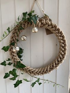 a wreath hanging on the side of a door