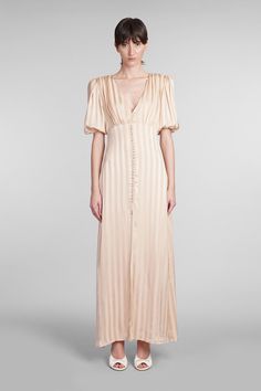 La galion Dress in beige viscose, V neck, short sleeves, Puff sleeve, front buttons detail, front slit, stripes motif, Made in Italy, 100% Viscose Zimmermann Dress, Prada Leather, Yoga Wear, Fashion Labels, Bridal Shoes, Dress Codes, Luxury Boutique, Color Splash, Dress To Impress