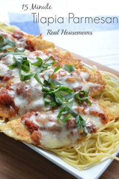 a close up of a plate of food with spaghetti