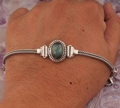 Made by   SHREEJAIPURSILVER925 Designed By  Make Mom's last-minute gift more thoughtful with a gift teaser new spring fashion  https://shreejaipursilver925.etsy.com Labradorite Bracelet 925 Sterling Silver Bracelet Fire Stone Bracelet Handmade Bracelet Natural Gemstone Jewelry Adjustable bracelet Boho #holidaytable #cyberweek #thanksgivingdecor #challenge #Chrismtasgift #Bridesmaid #Anniversary #Birthday #readytogift #Birthstoneitem #ringforwoman #anxietyring #Fastersellingitem #Bestseller #silverartisanwork #Silverboho #Ringlover #etsyseller #Starseller #Turquiseringlover #Spinner #Mother's Day gift items Note: Due to the natural formation of this gemstone. Slight variation in design and color are to be expected. click more  Item :- https://www.etsy.com/in-en/shop/Shreejaipursilver925?ref Bohemian Sterling Silver Oval Bracelet For Gifts, Handmade Oval Sterling Silver Bracelet For Gift, Oval Handmade Bracelets For Gifts, Spiritual Oval Sterling Silver Bracelet Gift, Handmade Oval Sterling Silver Bracelet Gift, Spiritual Sterling Silver Oval Bracelet Gift, Oval Sterling Silver Bracelet With Silver Clasp For Gifts, Handmade Sterling Silver Spiritual Bracelet, Oval Sterling Silver Gemstone Bracelet Gift