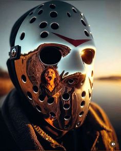 a man wearing a hockey mask with his mouth open