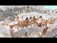 an animated christmas village with lots of trees and snowflakes on the top of it