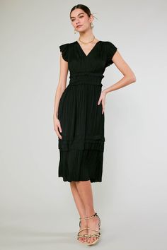 Allover pleating, fluttery cap sleeves, and sweet ruffle accents deliver a decidedly feminine look to this V-neck midi dress in a classic all black shade. A go-to for date night or daily wear easily paired with any second layer of your choosing. On Average, customers say this style runs large SMALL BODY LENGTH - 46" •Irregular pleating •V-neck •Cap sleeves •Allover pleating •Ruffle trim •Midi length Item number: 1790162 100% Polyester Hand Wash Cold Pink Shade, V Neck Midi Dress, Black Shade, Dusky Pink, Pleated Midi Dress, Feminine Look, Ruffle Skirt, Shades Of Black, Black Midi Dress