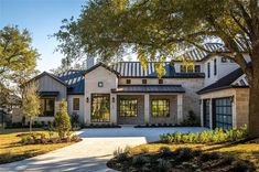 a large house that is surrounded by trees