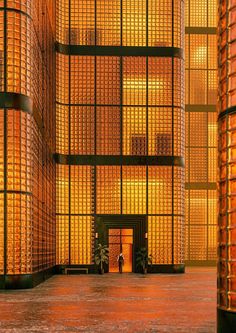 an image of a building that looks like it is made out of yellow glass bricks