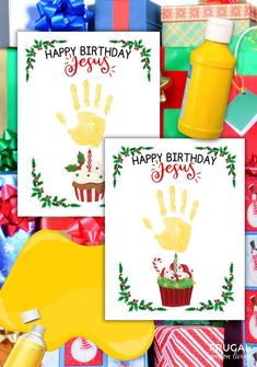 two greeting cards with handprints on them next to presents and confetti