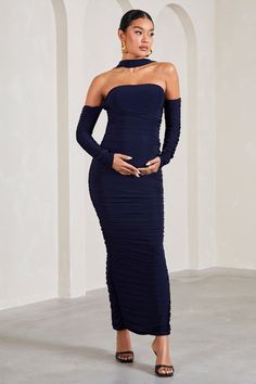 Coated in full body ruching. this curve-hugging maxi dress was designed to effortlessly sculpt your figure. Arriving in a rich navy shade of our signature stretch jersey. Joy is elevated through a delicate halter collar and long. ruched sleeves. Try styling this flattering piece with gold accents for the perfect date-night ensemble. Features - Premium stretch jersey- Bodycon fit - Fully ruched- Halter collar- Bardot neckline- Long sleeves- Invisible zip closure - Split hemline- Maxi length Sizing & Fit Model is 5'8.5" and wears UK size 8 / US size 4 Product Information Designed exclusively by Club L London Double layered with good stretch Premium jersey in Navy (95% Polyester. 5% Elastane) 140cm total length SKU: CL129855015 Navy Fitted Maxi Dress For Party, Fitted Long Sleeve Navy Maxi Dress, Navy Long Sleeve Fitted Maxi Dress, Fitted Navy Long Sleeve Maxi Dress, Navy Fitted Long Sleeve Maxi Dress, Navy Fitted Maxi Dress For Formal Occasions, Club L London, Velvet Prom Dress, Bridal Bachelorette Party