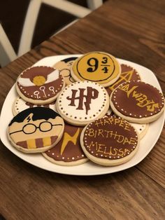 some harry potter cookies are on a plate