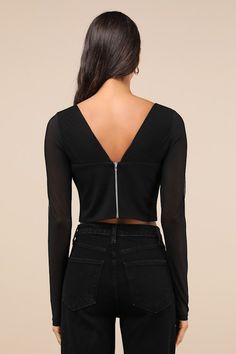 The Lulus Captivating Sense Black Mesh Long Sleeve Bustier Crop Top is exactly what you need to complete your best night-out looks! Stretchy ponte knit shapes this flirty top with a square neckline framed by long, sheer mesh sleeves. The fitted bodice features bustier-style seaming, ending at a rounded, cropped hem. An exposed silver zipper (and hidden clasp) at the back completes the look! Fit: This garment fits true to size. Length: Size medium measures 18" from shoulder to hem. Bust: Great fo Chic High Stretch Mesh Top For Party, Party Top With Zipper Closure And Long Sleeves, High Stretch Cropped Party Tops, Party Tops With Zipper Closure And Long Sleeves, High Stretch Cropped Tops For Party, Fitted Cropped Tops For Club, Fall Party Top With Zipper Closure, Fall Party Tops With Zipper Closure, Fitted V-neck Tops With Zipper Closure