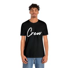 Check out our black Crew shirt, a must-have for event professionals immersed in the vibrant worlds of entertainment, music, and event production. This shirt combines comfort and style, making it the perfect choice for those working tirelessly behind the scenes. Whether you're a sound engineer, lighting technician, tour manager, or any other dedicated member of the production crew, this shirt is tailored to reflect your dedication to the craft. The jet-black canvas not only complements the dynamic energy of the entertainment industry but also serves as a versatile wardrobe staple. Transition seamlessly from backstage to after-hours events, showcasing your passion for the art while maintaining a polished appearance. Band Merch Crew T-shirt For Streetwear, Graphic Design Crew Neck Top For Music Festivals, Music Festival Graphic Crew Neck Tops, Graphic Crew Neck Top For Music Festivals, Band Merch Crew T-shirt For Fan Merchandise, Pre-shrunk Crew Neck Band Merch T-shirt, Crew Neck Top With Text Print For Music Festivals, Crew Neck Text Print Top For Music Festivals, Hip Hop Crew Neck T-shirt With Branding