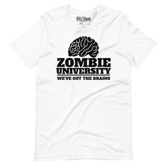 This funny Halloween zombie pun tee features a graphic of a brain alongside the words "Zombie University: We've Got the Brains." It's the perfect shirt for anyone who loves zombies, horror movies, and a clever play on words. After all, at Zombie U, brains are always on the menu! If you're someone who can't resist a good pun and loves zombies, this shirt is for you. It's perfect for reminding everyone that you've got the brains--and you're ready for whatever comes your way when the apocalypse hits! * 100% combed and ring-spun cotton (Heather colors contain polyester) * Fabric weight: 4.2 oz./yd.² (142 g/m²) * Pre-shrunk fabric * Side-seamed construction * Shoulder-to-shoulder taping * Blank product sourced from Nicaragua, Mexico, Honduras, or the US Zombie Tshirt For Women, Zombies 2 Disney T Shirts, Zombie Puns, Play On Words, Halloween Zombie, Best Puns, University Tshirt, The Apocalypse, Zombie Halloween