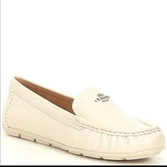 Brand New Classic White Loafers With Cushioned Footbed, Chic White Loafers With Leather Footbed, Elegant Coach Loafers For Office, Classic Coach Loafers With Flat Heel, Elegant Coach Loafers With Round Toe, Elegant Coach Loafers With Flat Heel, White Calf Leather Loafers For Spring, Elegant White Loafers With Leather Footbed, Elegant White Loafers