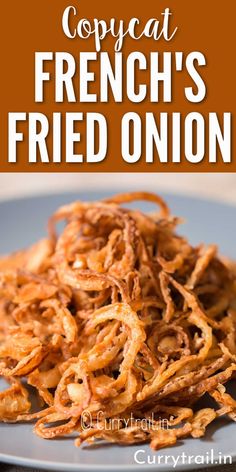 french fried onion on a plate with text overlay that reads copycat french's fried onion