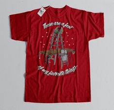 Hardcore Holidays T-shirt by WD Shirts - Happy Holidays to all wrestling fans. These are a few of my favorite things... tables, ladders & chairs. Questions? Please leave me a message - I'd be happy to help! Before you place your order, please read below: - CUSTOM-PRINTED SHIRTS - Your shirt is custom-printed upon order just for you, with high-resolution direct-to-garment technology. This method creates pin-sharp details and vivid colors. All of my images are digital mock-ups, so please keep Wrestling Christmas Shirt, Aew Wrestling, Wrestling Gift, Wrestling Shirt, Wrestling Shirts, Custom Printed Shirts, Mock Ups, My Favorite Things, Christmas Shirt