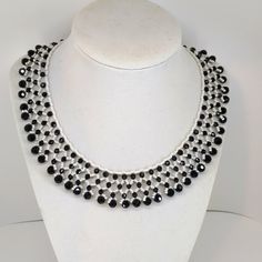 Black And White Seed Bead And Crystal Crocheted Necklace. Black Round Bead Bib Necklaces For Party, Handmade Black Crystal Necklaces For Party, Handmade Black Crystal Necklace For Party, Black Bib Necklace With Round Beads For Gift, Elegant Handmade Black And White Jewelry, Gift Black Choker With Large Beads, Cheap White Necklace With Black Beads, Black Choker With Large Round Beads, Black And White Seed Bead Necklace